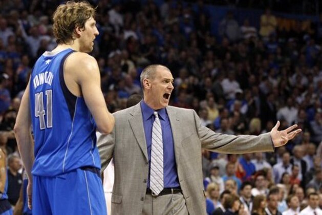 Dallas Mavericks head coach Rick Carlisle, right, and forward Dirk Nowitzki (41), of Germany, complain to an official about a call in the fourth quarter of an NBA basketball game against the Oklahoma City Thunder in Oklahoma City, Monday, March 5, 2012. Oklahoma City won 95-91. (AP Photo/Sue Ogrocki)