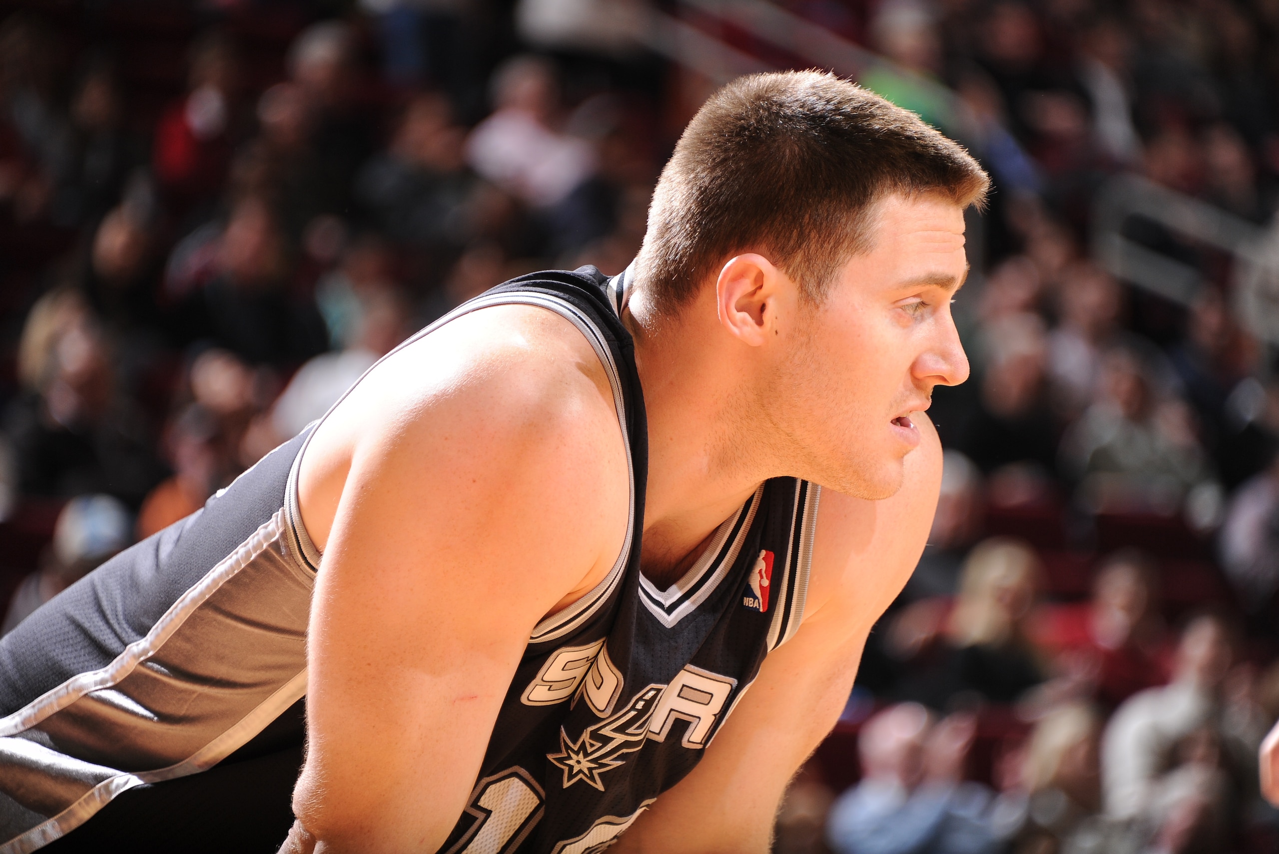 HOUSTON, TX - JANUARY 28:  Aron Baynes #16 of the San Antonio Spurs looks on during the game against the Houston Rockets on January 28, 2014 at the Toyota Center in Houston, Texas. NOTE TO USER: User expressly acknowledges and agrees that, by downloading and or using this photograph, User is consenting to the terms and conditions of the Getty Images License Agreement. Mandatory Copyright Notice: Copyright 2014 NBAE (Photo by Bill Baptist/NBAE via Getty Images)