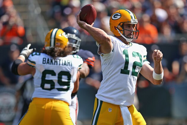 CHICAGO, IL - SEPTEMBER 28:  Aaron Rodgers #12 of the Green Bay Packers looks to pass during the first half of theirgame against the Chicago Bears at Soldier Field on September 28, 2014 in Chicago, Illinois.  (Photo by Jonathan Daniel/Getty Images)