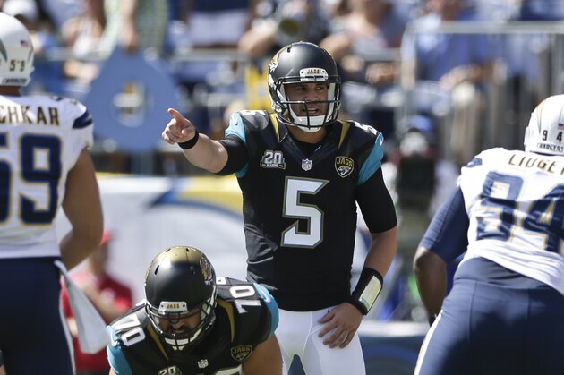 Jacksonville Jaguars quarterback Blake Bortles, making his first start in the NFL, makes adjustments at the line of scrimmage against the San Diego Chargers during the first half an NFL football game Sunday, Sept. 28, 2014, in San Diego.  (AP Photo/Gregory Bull)