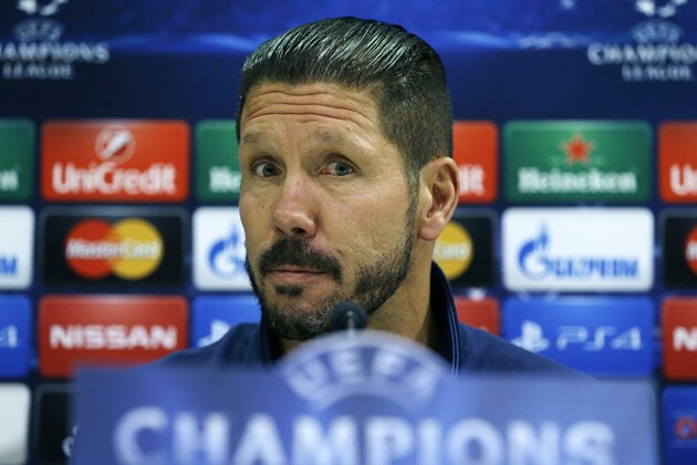 Atletico Madrid's coach Diego Simeone attends a press conference at the Georgios Karaiskakis stadium in the Piraeus port, near Athens on Monday, Sept. 15, 2014. Atletico Madrid will play against Olympiacos for the Group A Champions League soccer match on Tuesday. (AP Photo/Thanassis Stavrakis)
