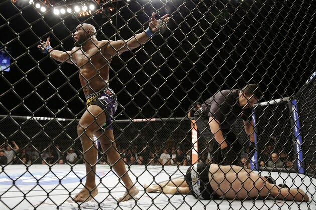 Yoel Romero celebrates after defeating Tim Kennedy in their middleweight mixed martial arts bout at UFC 178 on Saturday, Sept. 27, 2014, in Las Vegas. (AP Photo/John Locher)