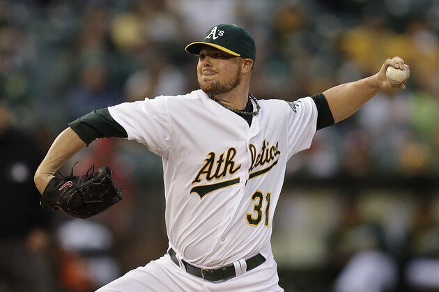 Oakland Athletics' Jon Lester works against the Philadelphia Phillies in the first inning of a baseball game Friday, Sept. 19, 2014, in Oakland, Calif. (AP Photo/Ben Margot)