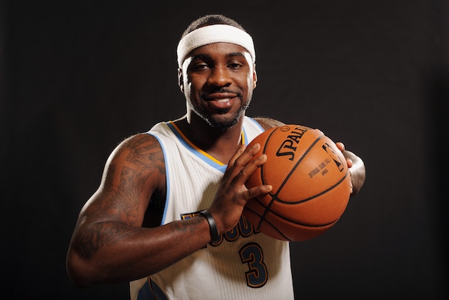 DENVER, CO - SEPTEMBER 29: Ty Lawson #3 of the Denver Nuggets poses for a photo during media day on September 29, 2014 at the Pepsi Center in Denver, Colorado. NOTE TO USER: User expressly acknowledges and agrees that, by downloading and/or using this Photograph, user is consenting to the terms and conditions of the Getty Images License Agreement. Mandatory Copyright Notice: Copyright 2014 NBAE (Photo by Garrett W. Ellwood/NBAE via Getty Images)