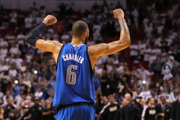 MIAMI, FL - JUNE 12:  Tyson Chandler #6 of the Dallas Mavericks celebrates after the Mavricks won 105-95 against the Miami Heat in Game Six of the 2011 NBA Finals at American Airlines Arena on June 12, 2011 in Miami, Florida. NOTE TO USER: User expressly acknowledges and agrees that, by downloading and/or using this Photograph, user is consenting to the terms and conditions of the Getty Images License Agreement.  (Photo by Mike Ehrmann/Getty Images)