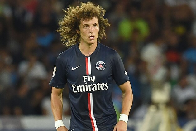 NAPLES, ITALY - AUGUST 11:  David Luiz of Paris Saint Germain  in action during the pre-season friendly match between SSC Napoli and Paris Saint-Germain FC at Stadio San Paolo on August 11, 2014 in Naples, Italy.  (Photo by Giuseppe Bellini/Getty Images)