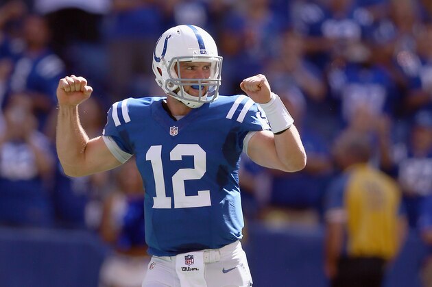 INDIANAPOLIS, IN - SEPTEMBER 28:  Andrew Luck #12 of the Indianapolis Colts celebrates after a touchdown during the game against the Tennessee Titans at Lucas Oil Stadium on September 28, 2014 in Indianapolis, Indiana.  (Photo by Andy Lyons/Getty Images)