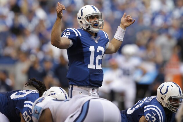 Indianapolis Colts quarterback Andrew Luck calls a play against the Tennessee Titans during the second half of an NFL football game in Indianapolis, Sunday, Sept. 28, 2014. (AP Photo/Darron Cummings)