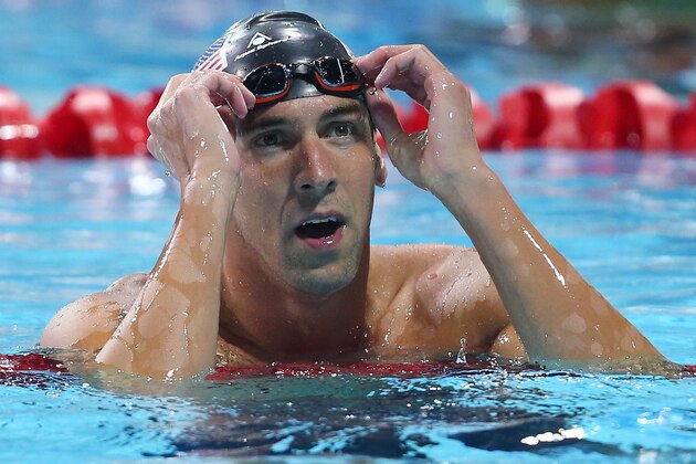 GOLD COAST, AUSTRALIA - AUGUST 23:  Michael Phelps of the United States looks on after winning the Men's 100m Butterfly Final during day three of the 2014 Pan Pacific Championships at Gold Coast Aquatics on August 23, 2014 in Gold Coast, Australia.  (Photo by Chris Hyde/Getty Images)
