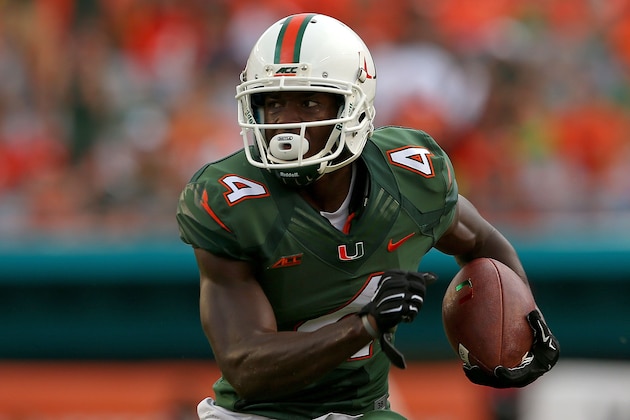MIAMI, FL - SEPTEMBER 13: Phillip Dorsett #4 of the Miami Hurricanes rushes during a game against the Arkansas State Red Wolves at Sunlife Stadium on September 13, 2014 in Miami, Florida.  (Photo by Mike Ehrmann/Getty Images)