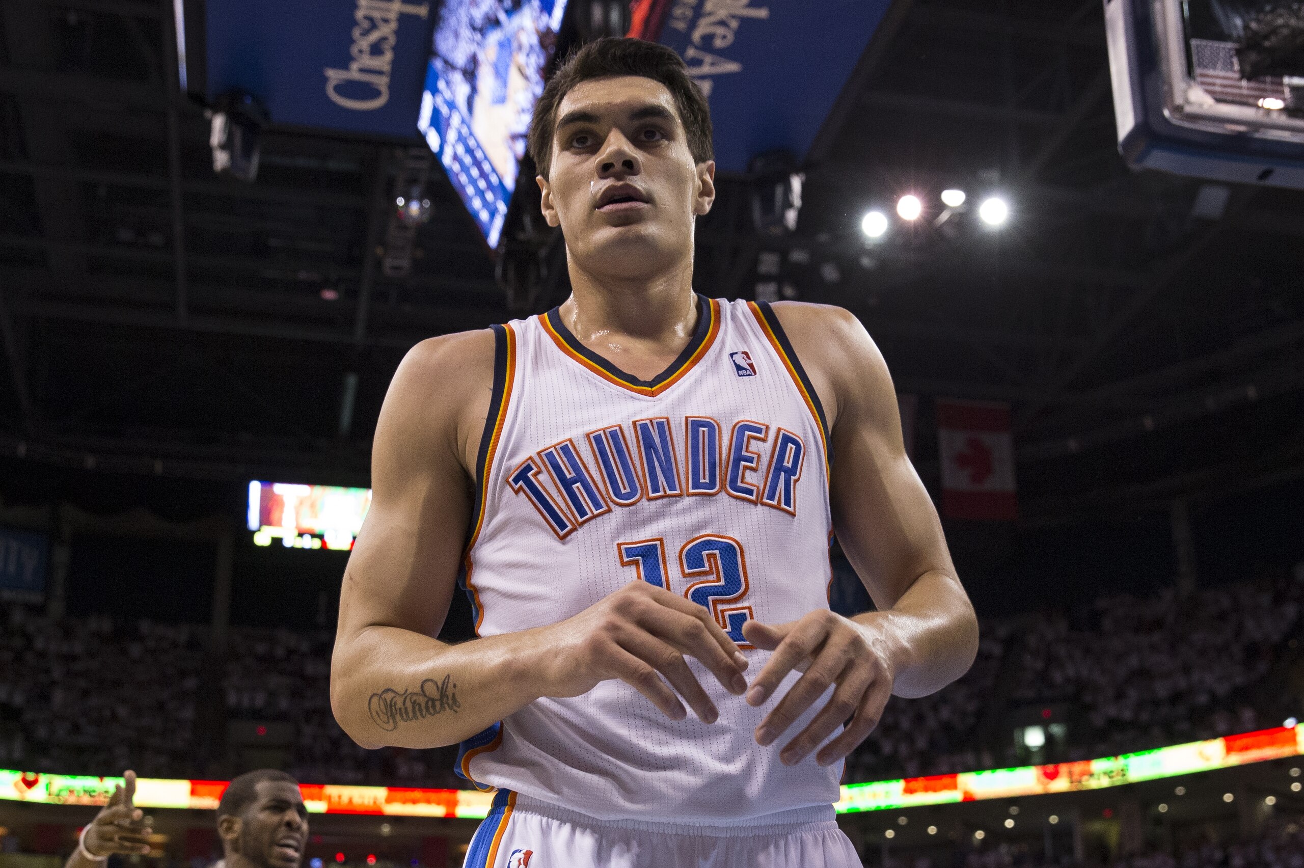 OKLAHOMA CITY, OK - May 13: Steven Adams #12 of the Oklahoma City Thunder on the court during Game 5 of the Western Conference Semifinals against the Los Angeles Clippers during the 2014 NBA Playoffs at the Chesapeake Arena on May 13, 2014 in Oklahoma City, Oklahoma. NOTE TO USER:  User expressly acknowledges and agrees that, by downloading and/or using this photograph, user is consenting to the terms and conditions of the Getty Images License Agreement. Mandatory Copyright Notice:  Copyright 2014 NBAE (Photo by Richard Rowe/NBAE via Getty Images)