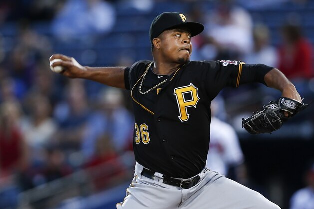 Pittsburgh Pirates starting pitcher Edinson Volquez works in the first inning of a baseball game against the Atlanta Braves, Thursday, Sept. 25, 2014, in Atlanta. (AP Photo/John Bazemore)