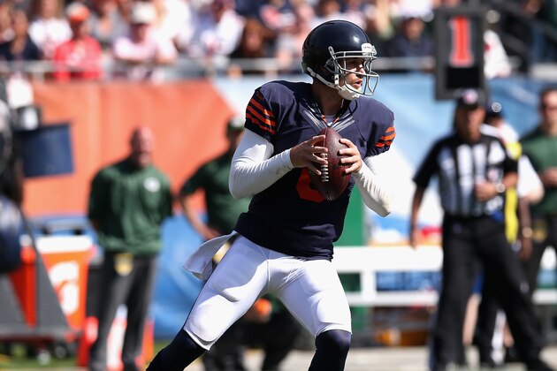 CHICAGO, IL - SEPTEMBER 28:  Jay Cutler #6 of the Chicago Bears looks for a receiver against the Green Bay Packers at Soldier Field on September 28, 2014 in Chicago, Illinois. The Packers defeated the Bears 38-17.  (Photo by Jonathan Daniel/Getty Images)