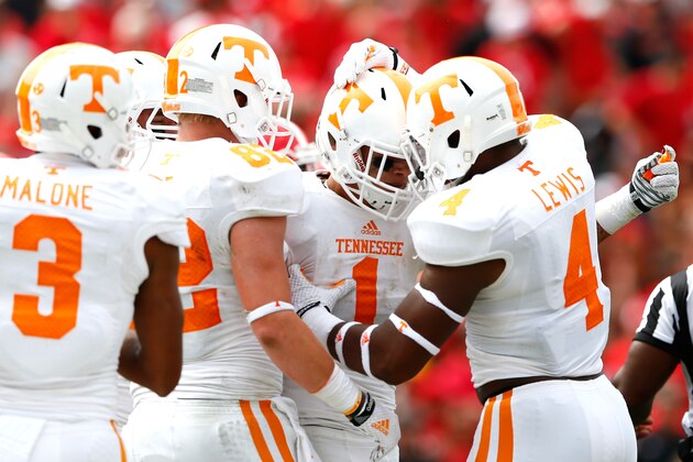 ATHENS, GA - SEPTEMBER 27:  Jalen Hurd #1 of the Tennessee Volunteers celebrates his touchdown against the Georgia Bulldogs with Vic Wharton #4 and Ethan Wolf #82 at Sanford Stadium on September 27, 2014 in Athens, Georgia.  (Photo by Kevin C. Cox/Getty Images)