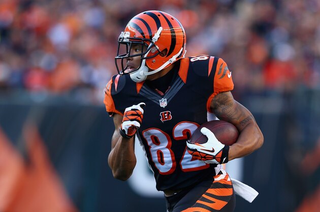 CINCINNATI, OH - OCTOBER 27:  Marvin Jones #82 of the Cincinnati Bengals runs with the ball during the NFL game against the New York Jets at Paul Brown Stadium on October 27, 2013 in Cincinnati, Ohio.  (Photo by Andy Lyons/Getty Images)