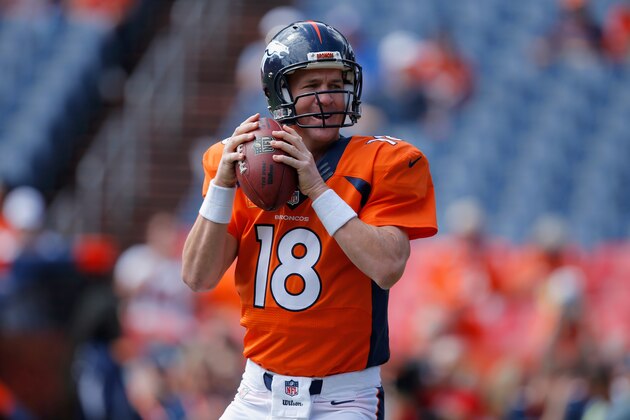 DENVER, CO - SEPTEMBER 14:  Quarterback Peyton Manning #18 of the Denver Broncos warms up prior to facing the Kansas City Chiefs at Sports Authority Field at Mile High on September 14, 2014 in Denver, Colorado. The Broncos defeated the Chiefs 24-17.  (Photo by Doug Pensinger/Getty Images)