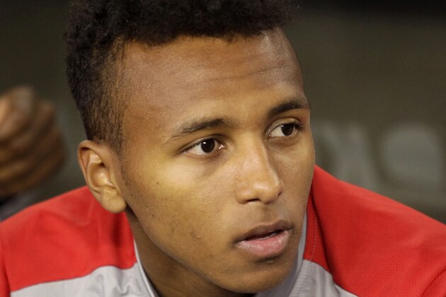 FILE - In this picture taken  April 2, 2014 U.S. forrward Julian Green sits on the bench during the international friendly soccer match against mexico  in Glendale, Ariz. Julian Green joined Hamburger SV on a season-long loan from Bundesliga rival Bayern Munich on Monday Sept. 1, 2014.  Hamburg announced the deal on its website but did not disclose a loan fee for the U.S. international.  (AP Photo/Rock Scuteri)