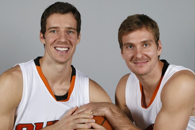 Phoenix Suns' Goran Dragic, left, and his brother, Zoran Dragic, pose for a photo during the Suns' media day, Monday, Sept. 29, 2014, in Phoenix. (AP Photo/Matt York)