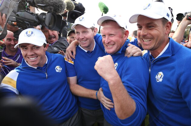 From left, Europe’s Rory McIlroy, Stephen Gallacher, Jamie Donaldson and Henrik Stenson  celebrate winning the 2014 Ryder Cup golf tournament at Gleneagles, Scotland, Sunday, Sept. 28, 2014. (AP Photo/Peter Morrison)
