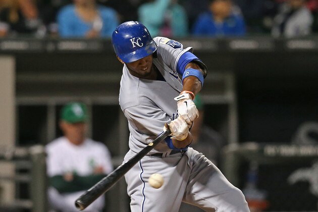 CHICAGO, IL - SEPTEMBER 25: Alcides Escobar #2 of the Kansas City Royals hits a run-scoring single in the 5th inning against the Chicago White Sox at U.S. Cellular Field on September 25, 2014 in Chicago, Illinois.  (Photo by Jonathan Daniel/Getty Images)
