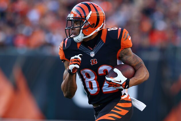 CINCINNATI, OH - OCTOBER 27:  Marvin Jones #82 of the Cincinnati Bengals runs with the ball during the NFL game against the New York Jets at Paul Brown Stadium on October 27, 2013 in Cincinnati, Ohio.  (Photo by Andy Lyons/Getty Images)