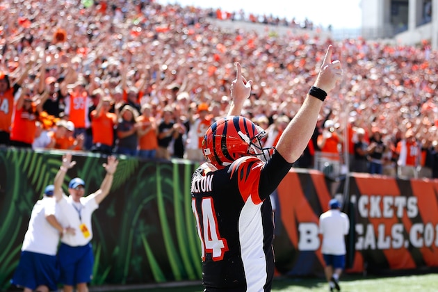 CINCINNATI, OH - SEPTEMBER 21:  Andy Dalton #14 of the Cincinnati Bengals celebrates after scoring a touchdown during the first quarter against the Tennessee Titans at Paul Brown Stadium on September 21, 2014 in Cincinnati, Ohio. (Photo by Joe Robbins/Getty Images)
