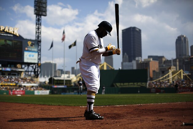 Pittsburgh Pirates' Josh Harrison (5) waits on deck during the third inning of a baseball game against the Milwaukee Brewers at PNC Park in Pittsburgh Sunday, Sept. 21, 2014. The Pirates won 1-0. (AP Photo/Gene J. Puskar)
