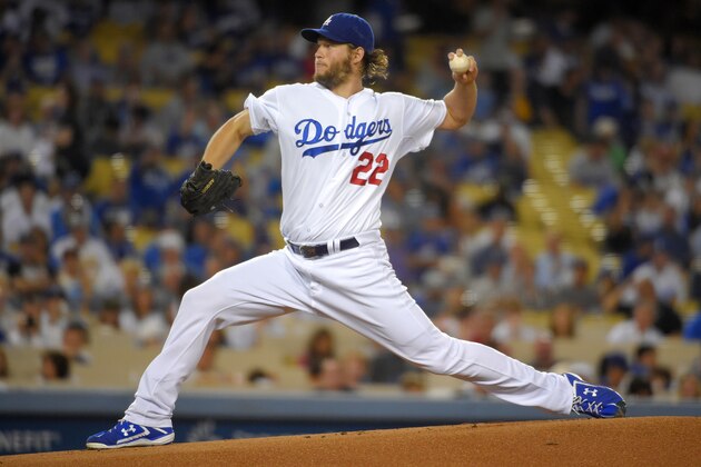 FILE - In this Sept. 24, 2014 file photo, Los Angeles Dodgers starting pitcher Clayton Kershaw throws to the plate during the first inning of a baseball game against the San Francisco Giants, in Los Angeles. The baseball playoffs are not only a second season but a second chance for the likes of Clayton Kershaw of the Dodgers, Adam Jones of the Orioles and Drew Storen of the Nationals to atone for past playoff flops. (AP Photo/Mark J. Terrill, File)