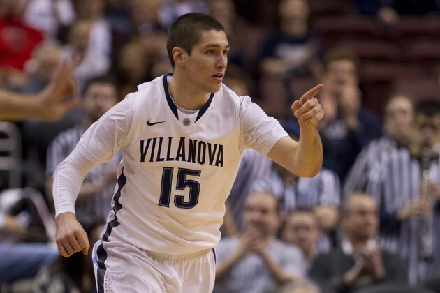 PHILADELPHIA, PA - MARCH 2: Guard Ryan Arcidiacono #15 points to his teammate after he made a three point basket against the Marquette Golden Eagles on March 2, 2014 at the Wells Fargo Center in Philadelphia, Pennslyvania. (Photo by Mitchell Leff/Getty Images)