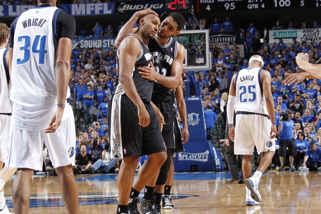 DALLAS, TX - APRIL 26:  Boris Diaw #33 and Tim Duncan #21 of the San Antonio Spurs talk during the game against the Dallas Mavericks during Game Three of the Western Conference Quarterfinals during the 2014 NBA Playoffs on April 26, 2014 at the American Airlines Center in Dallas, Texas. NOTE TO USER: User expressly acknowledges and agrees that, by downloading and/or using this Photograph, user is consenting to the terms and conditions of the Getty Images License Agreement. Mandatory Copyright Notice: Copyright 2013 NBAE (Photo by Glenn James/NBAE via Getty Images)