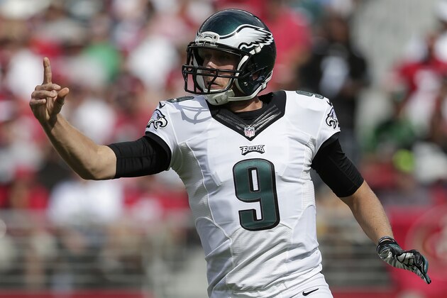 Philadelphia Eagles quarterback Nick Foles (9) follows through after throwing a pass during the second quarter of an NFL football game against the San Francisco 49ers in Santa Clara, Calif., Sunday, Sept. 28, 2014. (AP Photo/Marcio Jose Sanchez)