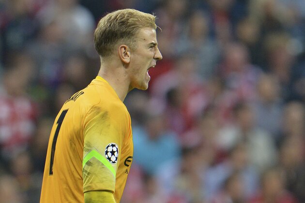 Manchester City's goalkeeper Joe Hart shouts during the Champions League group E soccer match between Bayern Munich and Manchester City in Munich, Germany, Wednesday Sept.17,2014. (AP Photo/Kerstin Joensson)
