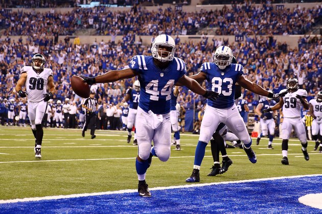 INDIANAPOLIS, IN - SEPTEMBER 15:  Running back Ahmad Bradshaw #44 of the Indianapolis Colts celebrates a fourth quarter touchdown against the Philadelphia Eagles during a game at Lucas Oil Stadium on September 15, 2014 in Indianapolis, Indiana.  (Photo by Andy Lyons/Getty Images)