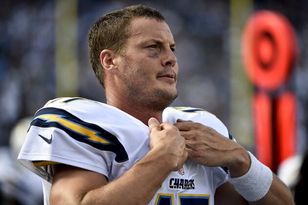 San Diego Chargers quarterback Philip Rivers watches from the sidelines during the second half of an NFL football game against the Jacksonville Jaguars Sunday, Sept. 28, 2014, in San Diego.  (AP Photo/Denis Poroy)