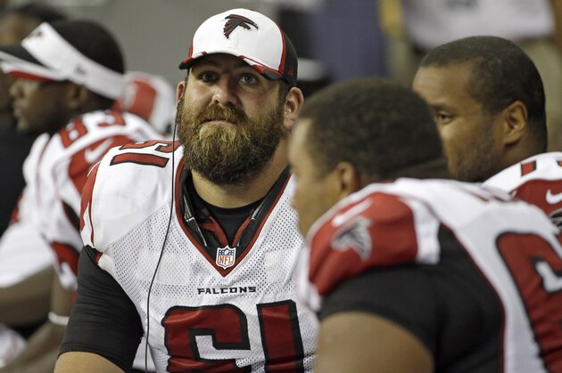 Atlanta Falcons center Joe Hawley (61) sits on the bench with teammates during the third quarter of an NFL preseason football game against the Houston Texans Saturday, Aug. 16, 2014, in Houston. (AP Photo/David J. Phillip)