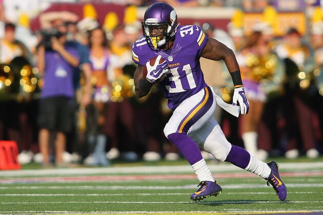MINNEAPOLIS, MN - SEPTEMBER 28:  Jerick McKinnon #31 of the Minnesota Vikings advances the ball against the Atlanta Falcons on September 28, 2014 at TCF Bank Stadium in Minneapolis, Minnesota. (Photo by Adam Bettcher/Getty Images)