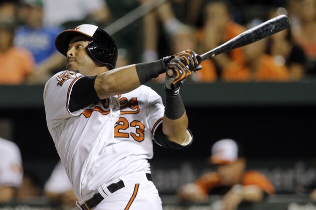 Baltimore Orioles' Nelson Cruz doubles in the seventh inning of a baseball game against the Tampa Bay Rays, Tuesday, Aug. 26, 2014, in Baltimore. Steve Pearce scored on the play, and Baltimore won 4-2. (AP Photo/Patrick Semansky)