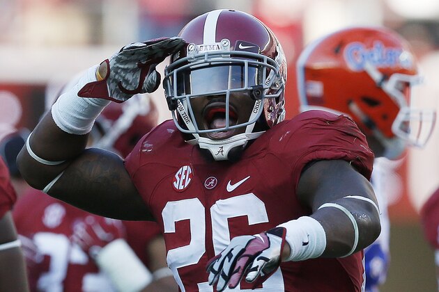 Alabama defensive back Landon Collins (26) celebrates after Alabama sacked Florida's quarterback during the second half of an NCAA college football game on Saturday, Sept. 20, 2014, in Tuscaloosa, Ala.(AP Photo/Brynn Anderson)