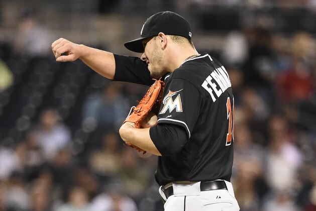 SAN DIEGO, CA - MAY 9:  Jose Fernandez #16 of the Miami Marlins wipes his face after giving up a hit during the sixth inning of a baseball game against the San Diego Padres at Petco Park May 9, 2014 in San Diego, California.  (Photo by Denis Poroy/Getty Images)