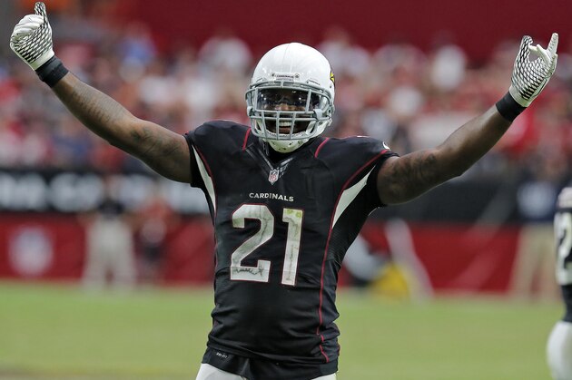 Arizona Cardinals cornerback Patrick Peterson (21) pumps up the crowd during the second half of an NFL football game against the San Francisco 49ers, Sunday, Sept. 21, 2014, in Glendale, Ariz. (AP Photo/Rick Scuteri)
