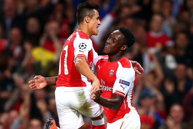 LONDON, ENGLAND - OCTOBER 01:  Danny Welbeck of Arsenal celebrates with team-mate Alexis Sanchez after scoring his team's second goal during the UEFA Champions League group D match between Arsenal FC and Galatasaray AS at Emirates Stadium on October 1, 2014 in London, United Kingdom.  (Photo by Paul Gilham/Getty Images)