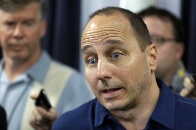 New York Yankees general manager Brian Cashman responds to a question about shortstop Derek Jeter after a news conference Wednesday, Feb. 19, 2014, in Tampa, Fla. Jeter has announced he will retire at the end of the 2014 season. (AP Photo/Chris O'Meara)
