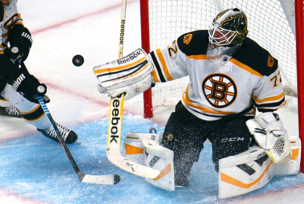 Sep 23, 2014; Montreal, Quebec, CAN; Montreal Canadiens left wing Rene Bourque (17) misses a chance to score a goal against Boston Bruins goalie Niklas Svedberg (72) as Boston Bruins defenseman Kevan Miller (86) defend during the second period at Bell Centre. Mandatory Credit: Jean-Yves Ahern-USA TODAY Sports