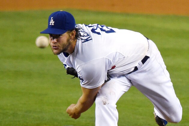 Los Angeles Dodgers starting pitcher Clayton Kershaw throws to the plate during the fourth inning of a baseball game against the Washington Nationals, Tuesday, Sept. 2, 2014, in Los Angeles. (AP Photo/Mark J. Terrill)