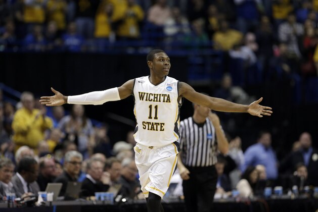 Wichita State's Cleanthony Early celebrates after hitting a shot during the second half of a third-round game against Kentucky of the NCAA college basketball tournament Sunday, March 23, 2014, in St. Louis. (AP Photo/Charlie Riedel)