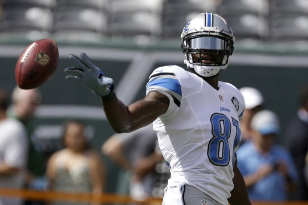 Detroit Lions wide receiver Calvin Johnson warms up prior to an NFL football game against the New York Jets, Sunday, Sept. 28, 2014, in East Rutherford, N.J. (AP Photo/Frank Franklin II)