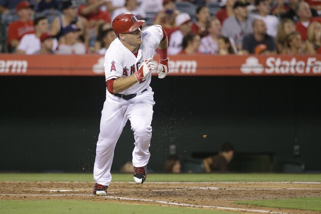 Los Angeles Angels' Mike Trout watches after hitting his second home run of the game during the third inning of a baseball game against the Houston Astros Saturday, Sept. 13, 2014, in Anaheim, Calif. (AP Photo/Jae C. Hong)