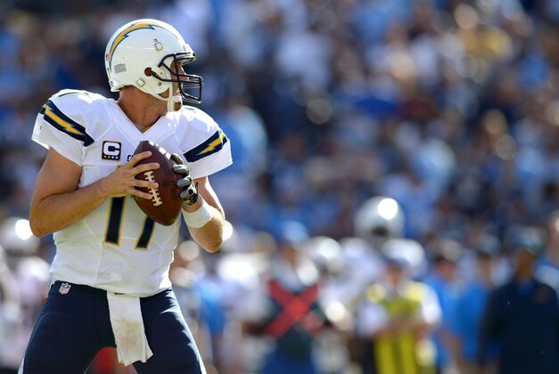 Sep 28, 2014; San Diego, CA, USA; San Diego Chargers quarterback Philip Rivers (17) prepares to throw the ball during the fourth quarter against the Jacksonville Jaguars at Qualcomm Stadium. Mandatory Credit: Jake Roth-USA TODAY Sports