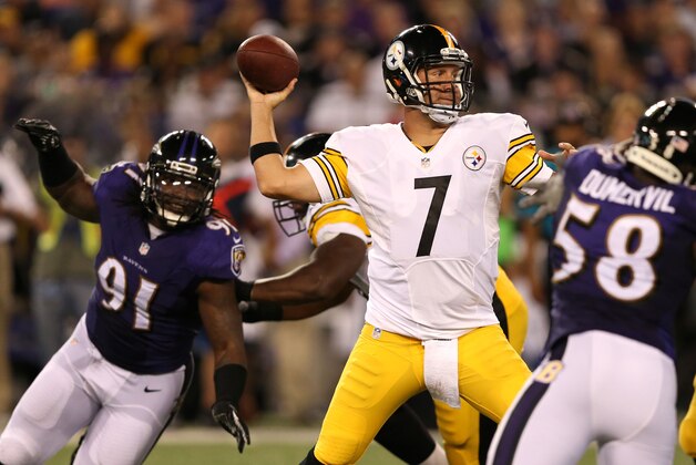 Sep 11, 2014; Baltimore, MD, USA; Pittsburgh Steelers quarterback Ben Roethlisberger (7) pressured by Baltimore Ravens linebacker Courtney Upshaw (91) and linebacker Elvis Dumervil (58) at M&T Bank Stadium. Mandatory Credit: Mitch Stringer-USA TODAY Sports