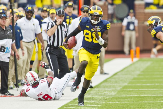 Michigan quarterback Devin Gardner (98) rushes down the field in the first quarter of an NCAA college football game against Utah in Ann Arbor, Mich., Saturday, Sept. 20, 2014. (AP Photo/Tony Ding) Michigan quarterback Devin Gardner (98) rushes down the field in the first quarter of an NCAA college football game against Utah in Ann Arbor, Mich., Saturday, Sept. 20, 2014. (AP Photo/Tony Ding)